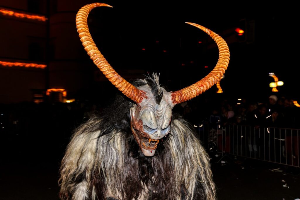 A German Krampus with orange horns ready to prowl on Krampusnacht