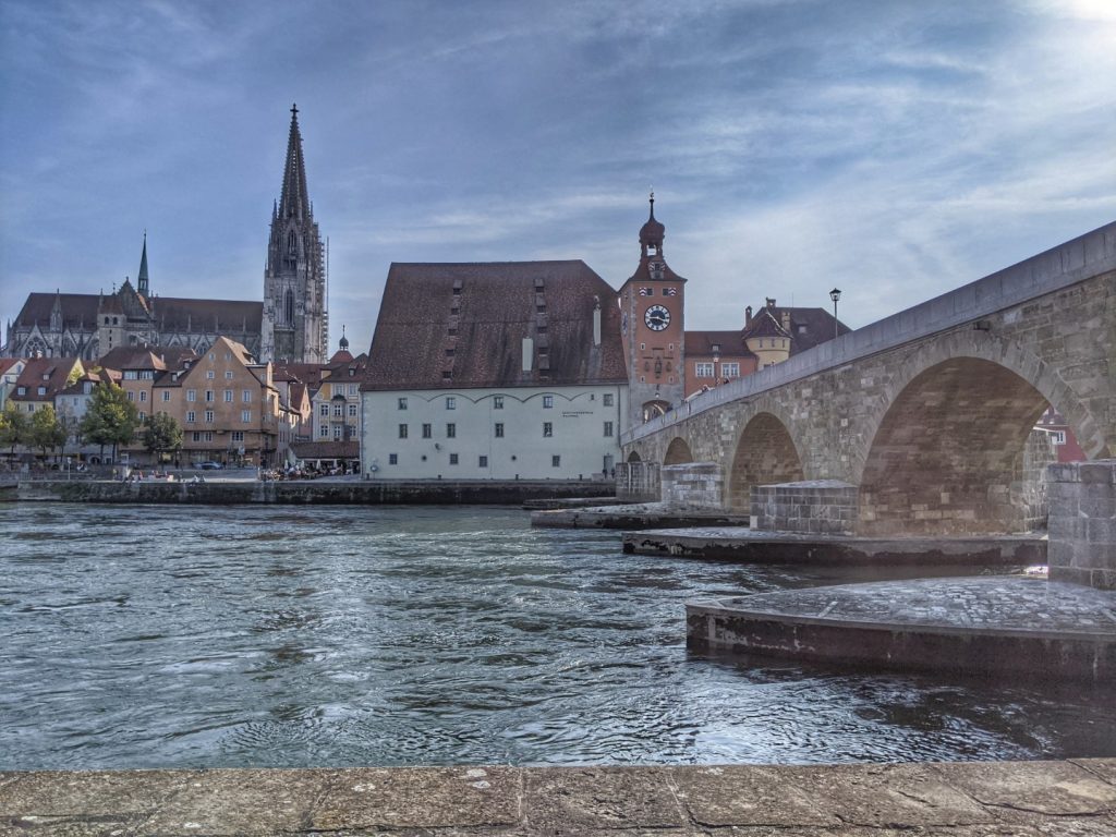 Regensburg skyline, stone bridge and danube river