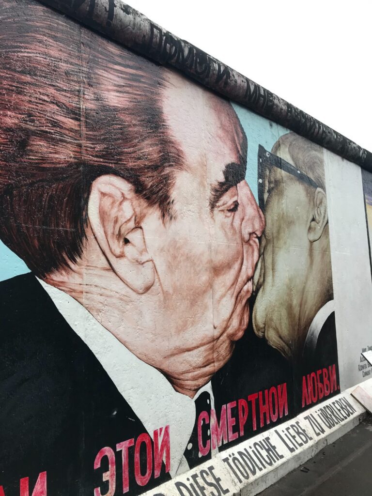 Berlin Wall two politicians kissing
