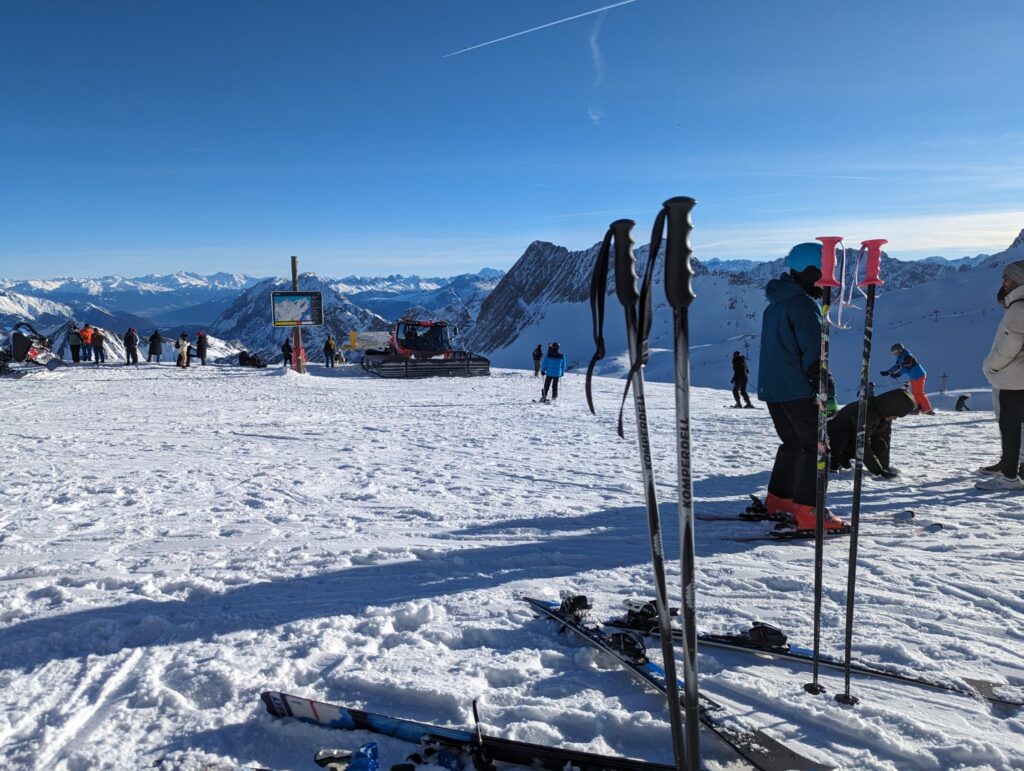 skis and ski poles in the snow on the Zugspitze mountain in Germany